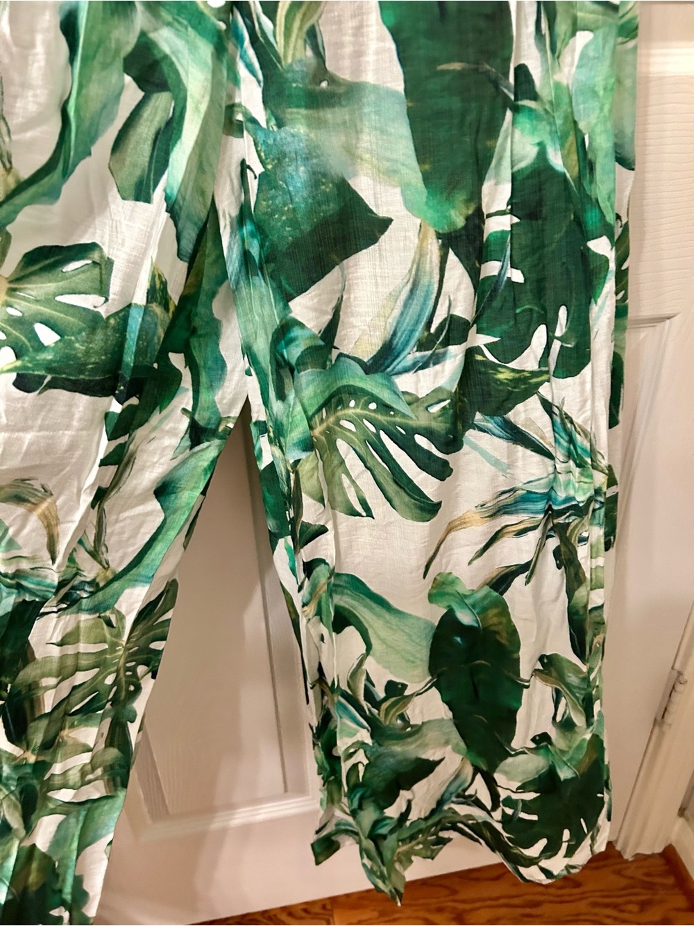 A. Peach Tropical Leaf Halter Wide Leg Jumpsuit with Pockets - Picture 5 of 11